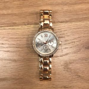 Rose gold watch with diamonds